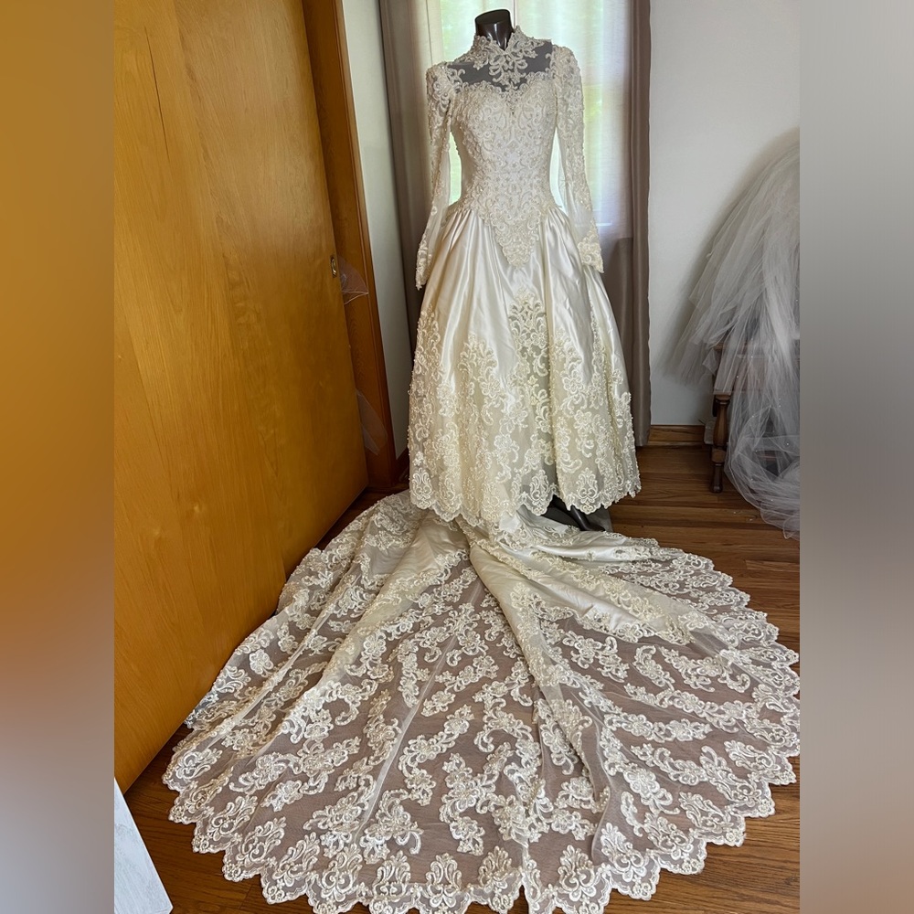 Vintage beaded masterpiece! Ivory wedding gown with cathedral train.